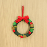 Handmade Christmas Wreath with Red Bow and Cherry Berries for Festive Home Decoration